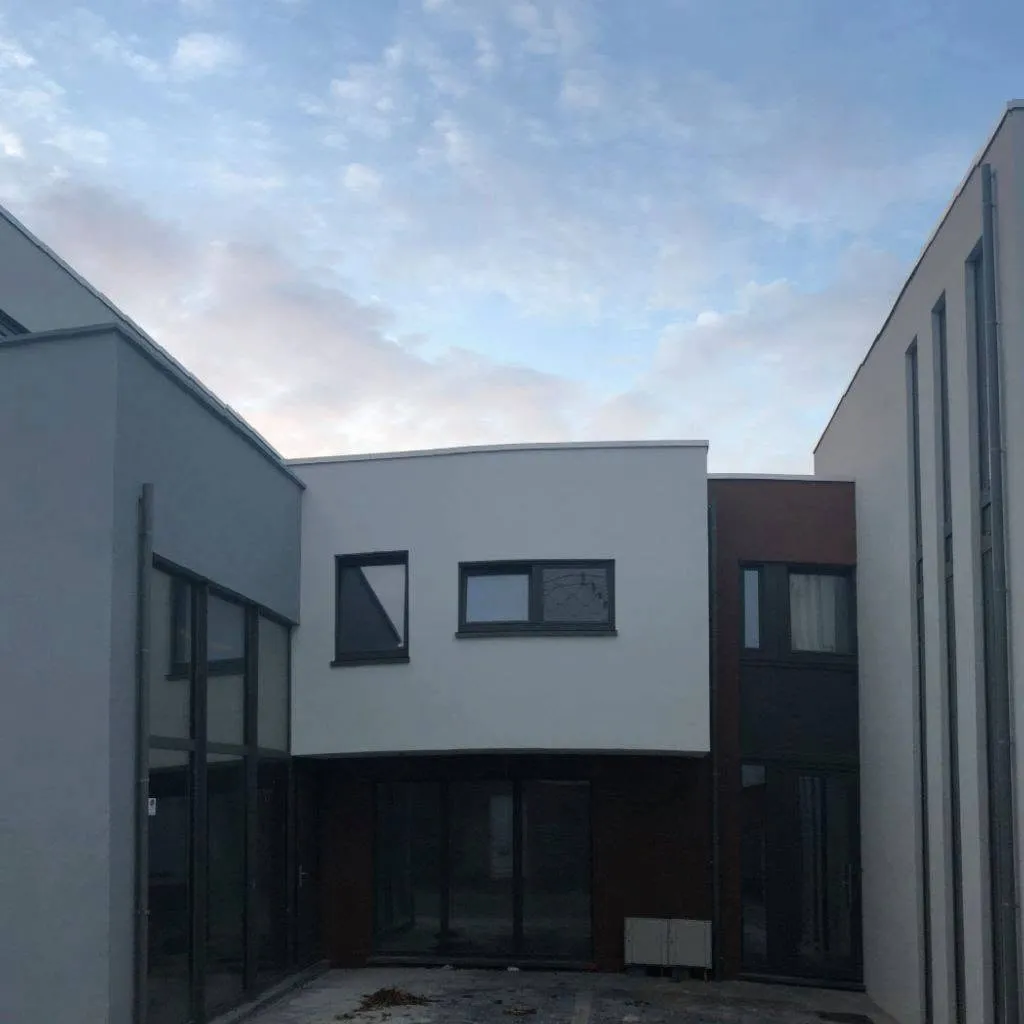 7 logements et 5 rez commerciaux à Farciennes